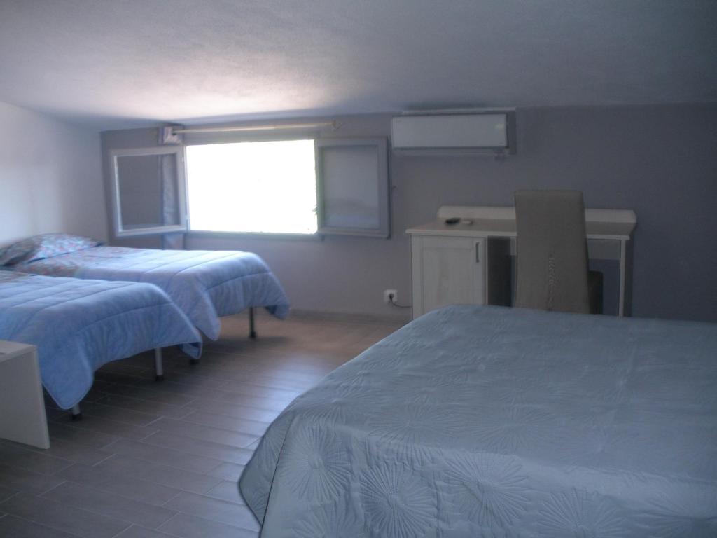 Hotel Casa Di Mama ปอร์โต-เวคคีโอ ห้อง รูปภาพ